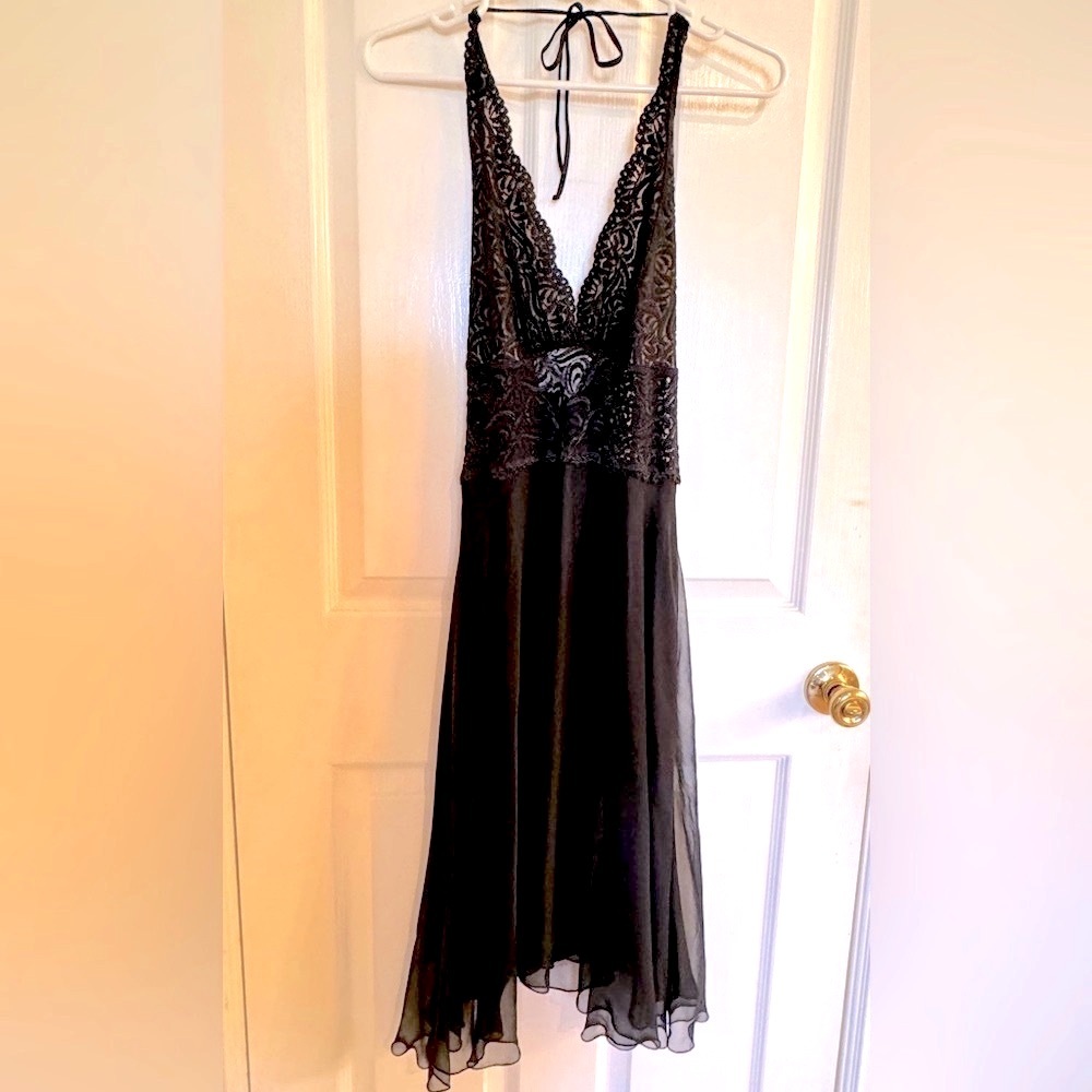 Bebe Vintage Black lace halter dress. It is in excellent condition. S/M